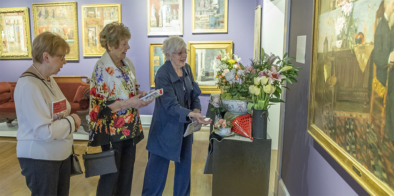 Visitors Visitors enjoy the Evoking Eleanor Gallery