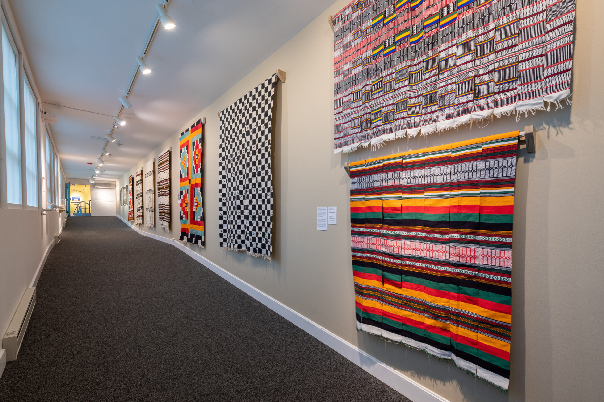 Cloth is Money: Textiles from the Sahel Cloth textiles from Cloth is Money: Textiles From the Sahel adorn the walls of the connector gallery